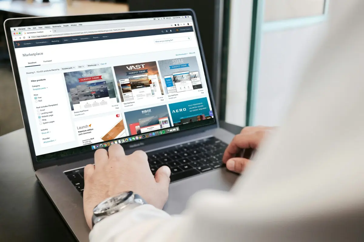 Customer updating saved payment details on a laptop to recover a failed subscription payment